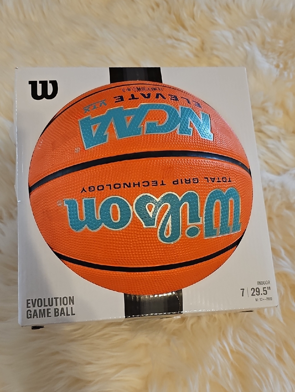 Wilson Orange Basketball with Teal Logo - Indoor Game Ball